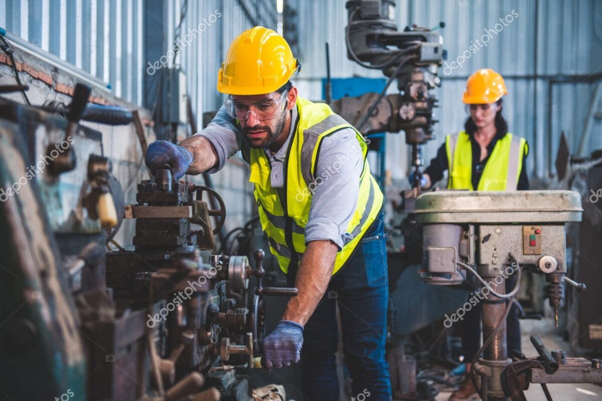Heavy industry workers working on the metal fabricate